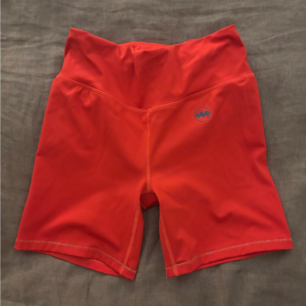orange janji bike shorts